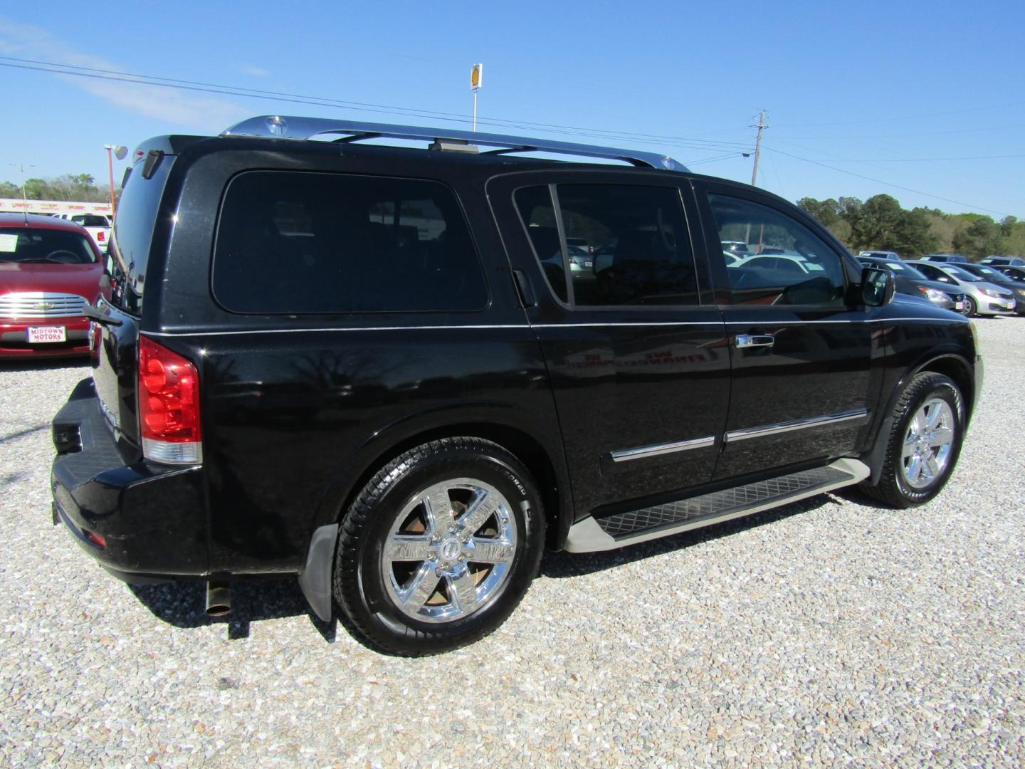 2014 Black Nissan Armada Platinum 2WD (5N1BA0NF9EN) with an 5.6L V8 DOHC 32V FFV engine, Automatic transmission, located at 15016 S Hwy 231, Midland City, AL, 36350, (334) 983-3001, 31.306210, -85.495277 - Photo#7